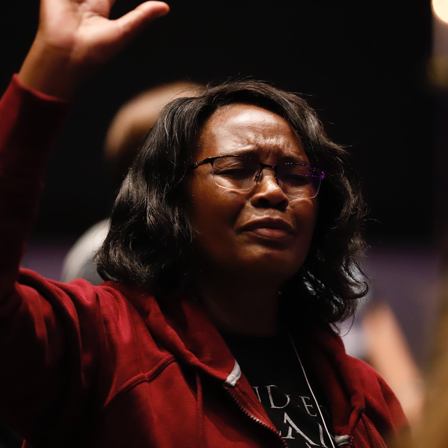 woman praying - Kindle The Flame