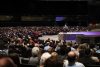 Rhema Bible Church in Broken Arrow full of people and Pastor Kenneth Hagin in the Pultpite.